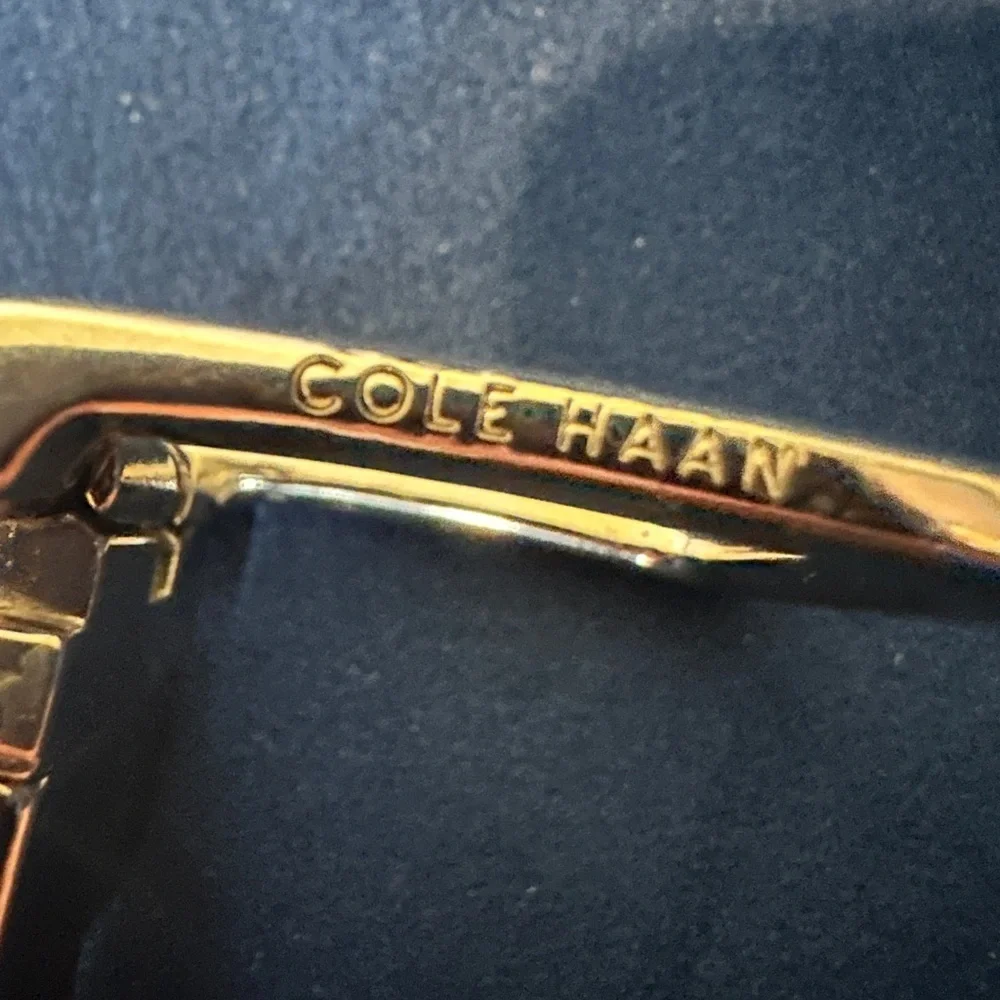 Cole Haan reversible belt. Size 42 silver buckle. Brown & dark brown